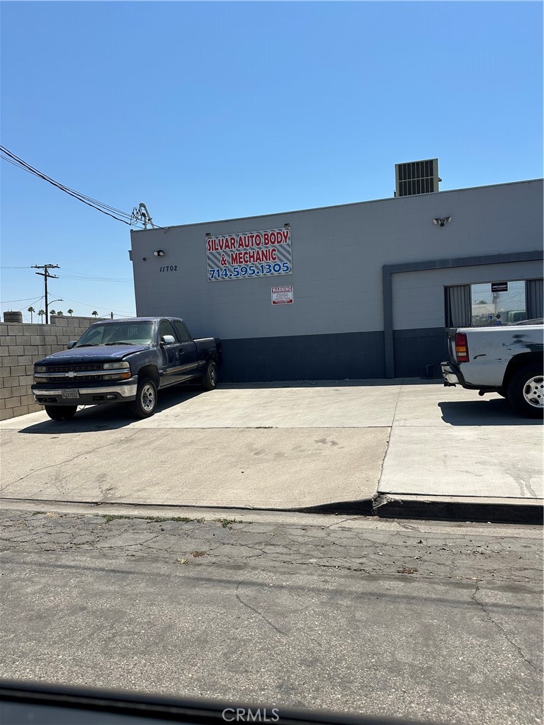 Excellent Free standing industrial building in Central Orange County. Great access to 22 Freeway and Harbor blvd. Property has a large fenced in yard and one of the largest lots on this street. Currently the property has a tenant on a lease that ends 12/31/2025 and is using the property as an Auto Repair business. Corner lot with office and restroom. Large gated lot with 2 roll up doors. Customer parking in front with 4 spaces. Great potential if you wanted to renovate the space. Yard can hold 15-20 vehicles.