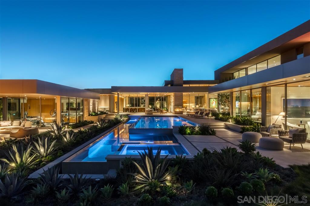 Designed and built by world-renowned architects, Marmol Radziner, this exquisite modernist retreat combines dramatic architecture and design with warm and inviting spaces. Comprised of three perfectly-sited structures anchored by curated outdoor spaces, it was built with the highest quality standards and maximum attention to detail. No compromises were made in building this one-of-a-kind residence that offers seamless indoor and outdoor living. See Supplement and attached informational documents. There are beautiful, bay|city, day-and-night views from the second story. This modernist retreat is comprised of three separate structures sited on a flat acre; the two-story main residence, climate-controlled automobile gallery with luxe office/den above, and a glorious space housing a world-class gym and spa facility. All open to delightful green areas, inviting entertainment spaces and a walking path. Live green roofs are used beautifully. The gorgeously-finished, climate-controlled auto gallery can serve as a multi-purpose space for entertaining, as an art gallery, etc. Offers elevated living and the ultimate in privacy. To see is to believe. Sewer: Sewer Connected Topography: LL