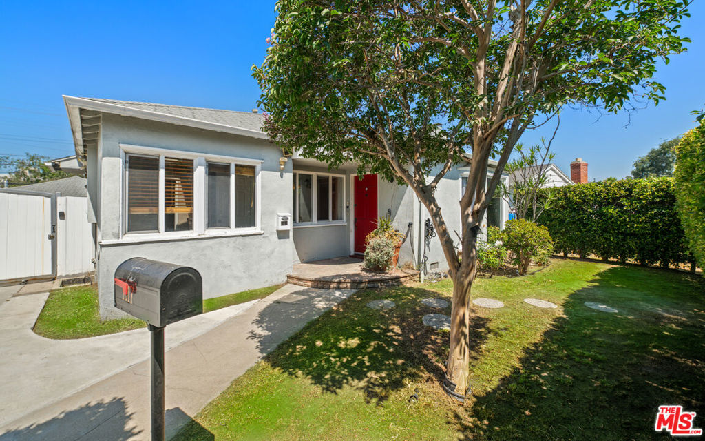 Tucked away on a quiet cul-de-sac in the desirable Mid-City neighborhood, this property blends classic charm with modern touches. The main home offers 2 spacious bedrooms and 2 bathrooms, a sun-filled formal dining room, and a welcoming living room with a charming bay window and cozy fireplace. The kitchen is outfitted with granite countertops and stainless steel appliances, with a separate laundry room conveniently located just off the kitchen. In addition to the main residence, the property includes a detached bonus art studio with its own bathroom ideal space for creative pursuits, a home office, or guest quarters. At the rear of the lot, a brand-new 500 sq ft ADU (built in 2024) with its own private yard provides an airy open-concept layout with dedicated living, dining, and kitchen areas, offering flexibility for guests, extended family, or rental income. The grassy backyard provides plenty of room for outdoor relaxation and entertaining, with space for a spa or small pool to complete the retreat-like setting. Perfectly situated near shopping, dining, freeways, and public transit, this home presents a unique opportunity for both homeowners and investors alike.