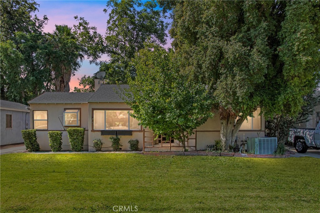 One of Riversides best neighborhoods. Come see this older beautiful home that has the potential to be an Amazing primary residence. 3 large bedrooms with plenty of closet space. 2 bedrooms on one side and the Master bedroom towards the back of the house. Living room with Cozy fireplace and a Huge Family room for entertaining or just relaxing and watching a movie. The country kitchen is a good size with lots of cupboard space and counter tops. Indoor washing machine area. 2 full bathrooms with shower tub combos. Back yard is huge with lots of fruit trees and huge shady trees. Patio. and lots more potential. Come see.