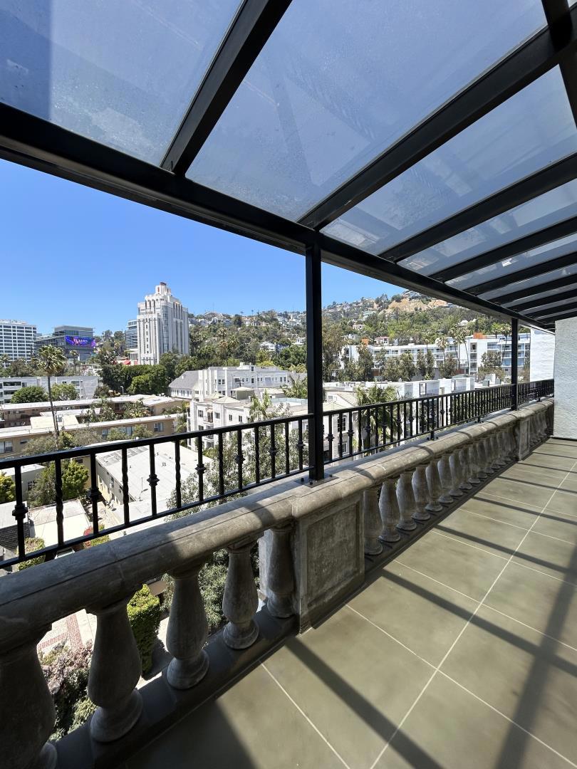 The penthouse in unit #602 is 2,600 square feet large, features three bedrooms and three full bathrooms, as well as one powder room. This stunning home overlooks the Hollywood hills from a large terrace with entrances off the kitchen, formal dining area, as well as the primary bedroom. Equipped with state-of-the-art appliances surrounded by sleek Cambria stone can be found in a unique, tucked away kitchen. The extra large in-unit washer/dryers hidden in a secret entrance through the powder room is where you'll also find the heart of the surround sound control system. Retractable screens hide within the windowpanes so as not to disturb the panoramic view, as well as an vaulted sky light in the primary shower are just some of the minor details that make a major impact.