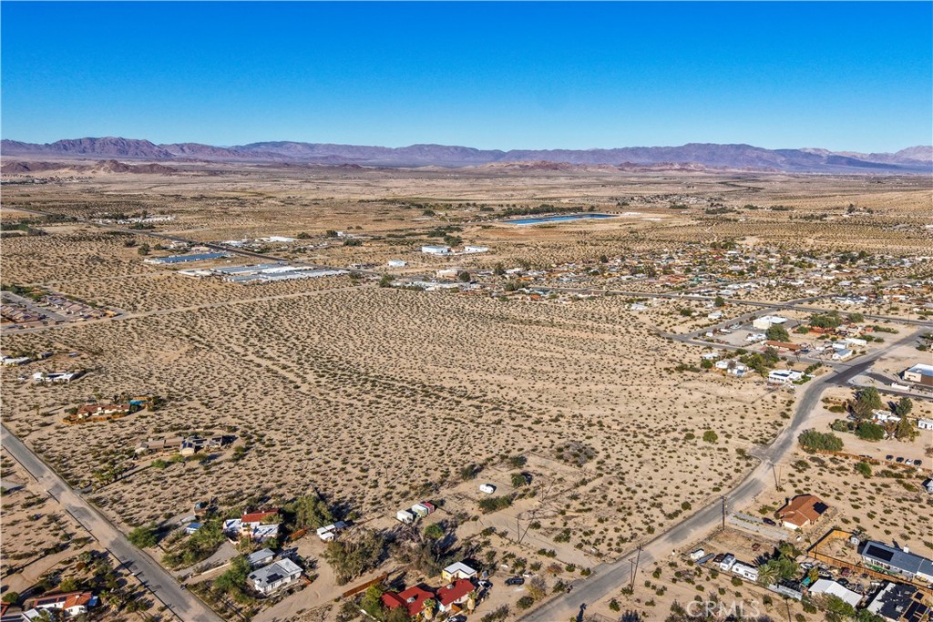 Amazing opportunity to purchase 58 acres with these 9 scenic parcels. Located between the Turtle Rock subdivision and Two Mile Road with convenience to local services, the military base  and the Joshua Tree National Park. Property has an existing site plan featuring 348 condo units and 37 homes. Incredible views to the north add to the charm of the property. Utilities appear to be close. Don't miss your chance to expand your portfolio and creative an imaginative family environment.