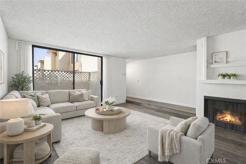 Photo of 22038 Vanowen St. St #215, Woodland Hills, CA 91303 (MLS # SR25235684)