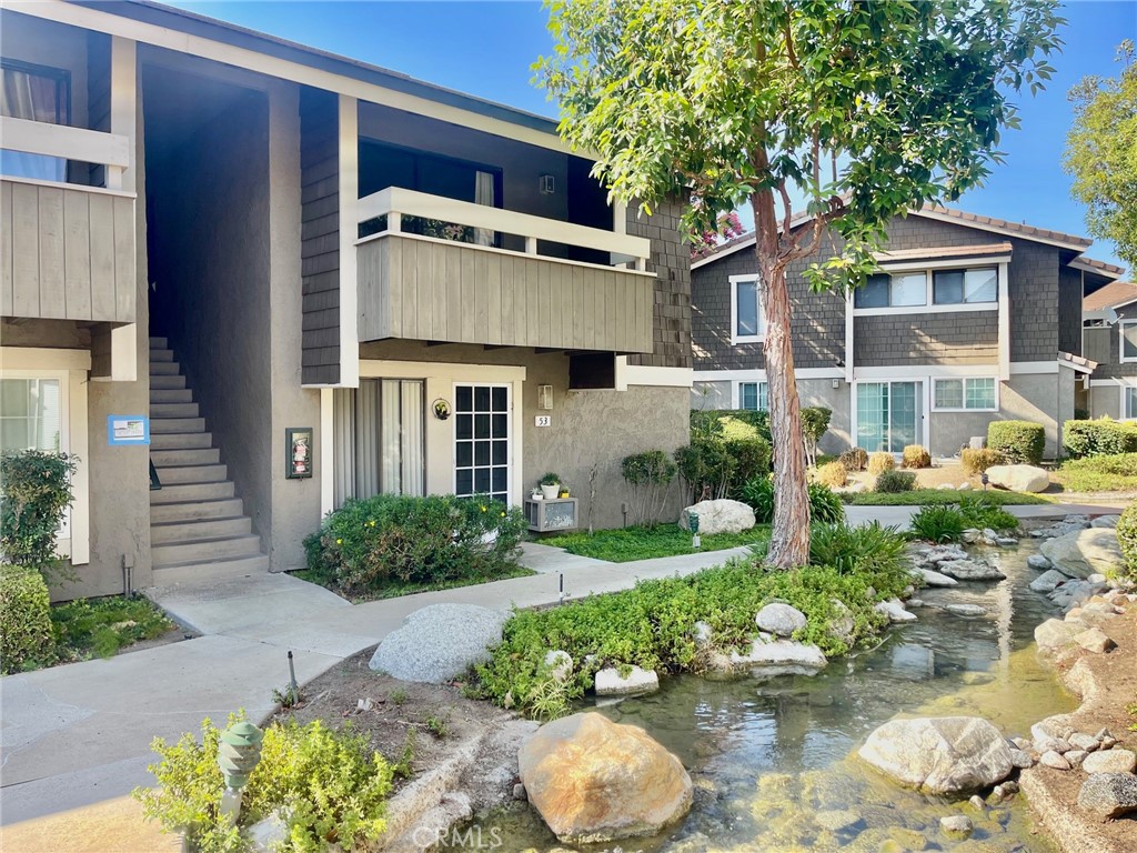 This inviting upper unit offers a spacious 1 bedroom unit complete with 2 closets, a roomy bathroom, updated kitchen with granite counters, stainless appliances, living space with vaulted ceilings, and a nicely shaded balcony overlooking the peaceful surroundings. You'll appreciate the convenience of easy street parking in addition to your own assigned carport. Explore the nearby local shops, highly regarded Irvine Unified School District, and easy freeway access just minutes away. Residents enjoy access to fantastic amenities including two pools, relaxing spas, tennis courts, a clubhouse, EV charging stations, and on-site laundry facilities. Rent includes sewer, water & trash. Onsite community laundry.