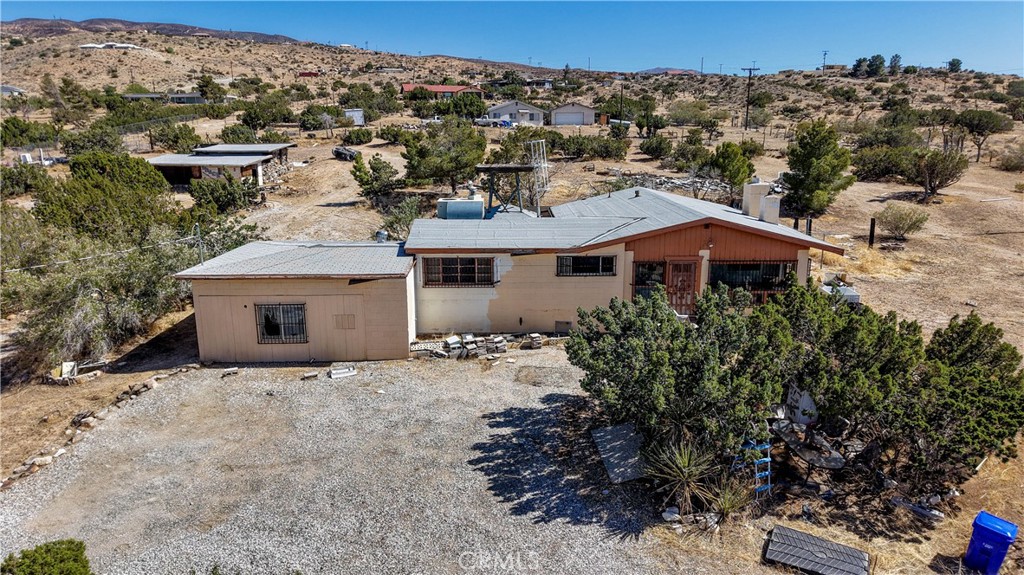 Nestled on 3 acres in the serene Apple Valley foothills, this charming single-story ranch-style home offers a perfect blend of tranquility and functionality. Featuring 1 bedroom, 1 bath, and a thoughtfully laid-out bonus room that’s ideal for a home office, studio, or guest space. This home presents a rare opportunity for those seeking peaceful, rural-style living without sacrificing convenience. Whether you're drawn by the spacious lot, the flexible interior layout, or the beautiful desert vista views, this property delivers value and lifestyle in equal measure.