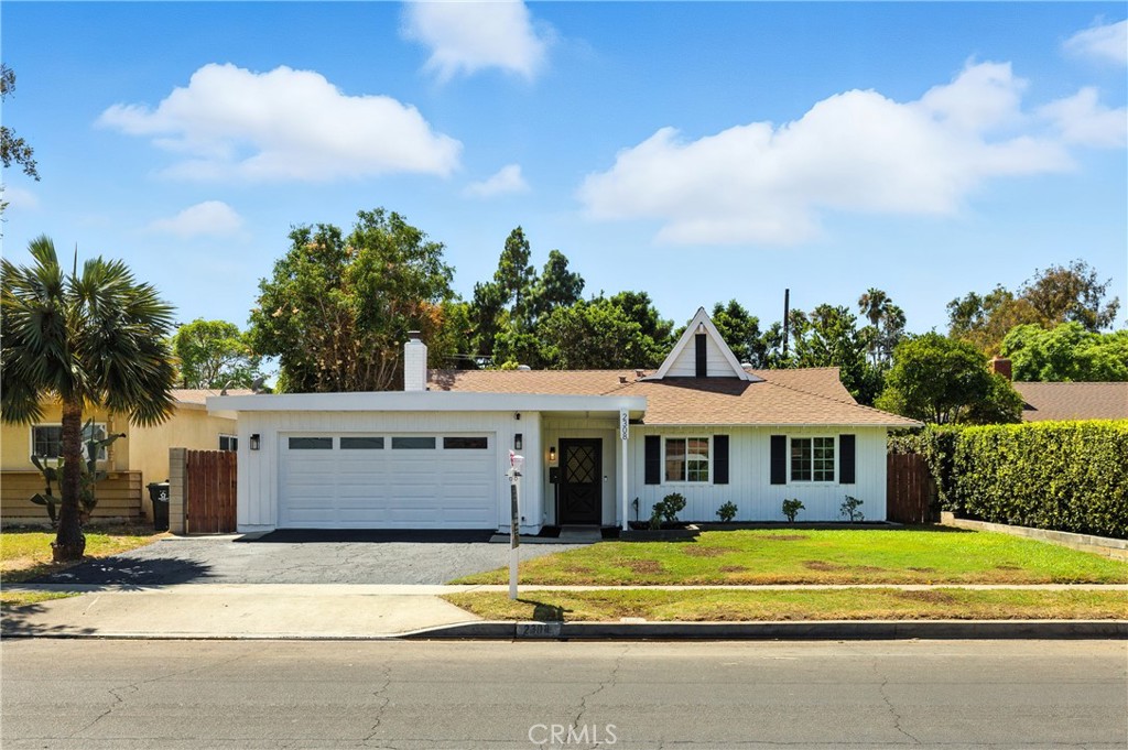 Don’t miss this rare opportunity to own a beautifully updated 5-bedroom, 2-bath single-family home in the heart of Santa Ana. A perfect find for first-time buyers or anyone looking to upgrade from a condo or townhome. With 1,407 sq ft of well-designed living space, this charming residence offers a thoughtful layout that flows effortlessly from room to room. Step inside to a welcoming entryway that doubles as a functional mudroom and ideal for keeping your home organized and clean. The interior has been freshly painted and features modern light fixtures, durable laminate flooring throughout, and brand-new plush carpet in select bedrooms, creating a warm and inviting atmosphere. The kitchen is fully equipped with sleek stainless-steel appliances, perfect for preparing your favorite meals, while both bathrooms have been tastefully upgraded with contemporary finishes. A brand-new garage door, along with fresh exterior paint, adds instant curb appeal. Enjoy the flexibility of a 2-car garage plus additional driveway parking. The spacious backyard is a blank canvas either ready for your dream garden, a play area, or easy-care landscaping to suit your lifestyle. Located in a friendly neighborhood just minutes from John Adams Elementary and McFadden Intermediate, with the added peace of mind of a nearby fire station, this home offers both comfort and convenience. Whether you're starting a new chapter or looking for more space to grow, this move-in ready home checks all the boxes. Schedule your tour today and make this Santa Ana gem your own!