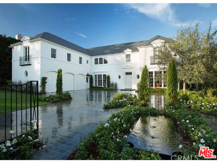 Style and Substance embody this brand new Georgian Estate in prime Beverly Hills. Completed in 2015 and designed by Thomas Proctor, this exquisite traditional is set to become a landmark. Conceived to blend 1930's period details with modern living; features include soaring 11ft ceilings, walnut paneled library w/bar, vast formal living room, generous dining room and sun filled kitchen/family room. Public rooms look out to beautifully landscaped grounds and pool. Luxurious master suite w/ dual baths in book matched marble. Total of 8 bedrooms/9 baths plus 3 powder rooms. Ideal for a  large family,  5 bedrooms upstairs with adjoining play room. Entertainment level offers state of the art screening room, sit down wine cellar and gym. Pool house includes bedroom suite and living  room with covered terrace. Perfect for guests.  A rare and special offering. Shown only to prequalified Buyers.