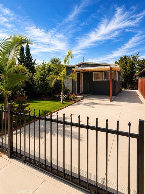 Photo of 937 E 103rd PL PL, Los Angeles, CA 90002 (MLS # DW26160283)