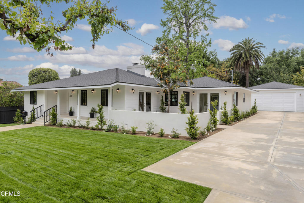 Completely reimagined and fully remodeled, this stunning transitional home in the heart of Sierra Madre blends traditional charm with modern luxury. Featuring 3 bedroom suites, 3.5 bathrooms, and just over 2,000 sq ft of thoughtfully designed living space on a generous 11,070 sq ft lot. Enjoy a spacious open floor plan with a brand-new kitchen, oversized island, top-of-the-line appliances, pantry closet, and adjacent dining area. A built-in wet bar adds a statement of style and sophistication. Engineered hardwood floors run throughout, with high-end tile finishes in all bathrooms.The primary suite offers a spa-like bathroom with dual vanity and double shower heads. French doors in multiple rooms create a seamless indoor-outdoor flow to the front courtyard and private rear patio -- perfect for entertaining. The home also includes a powder room, separate laundry with upper cabinets, and a fully drywalled two-car garage. Every detail has been upgraded: kitchen, bathrooms, roof, HVAC, plumbing, electrical, windows, doors, tankless water heater, landscaping, sprinkler system, driveway, walkways, and more. Located just moments from downtown Sierra Madre's shops, restaurants, and parks. This is luxury living -- turnkey and ready for you.