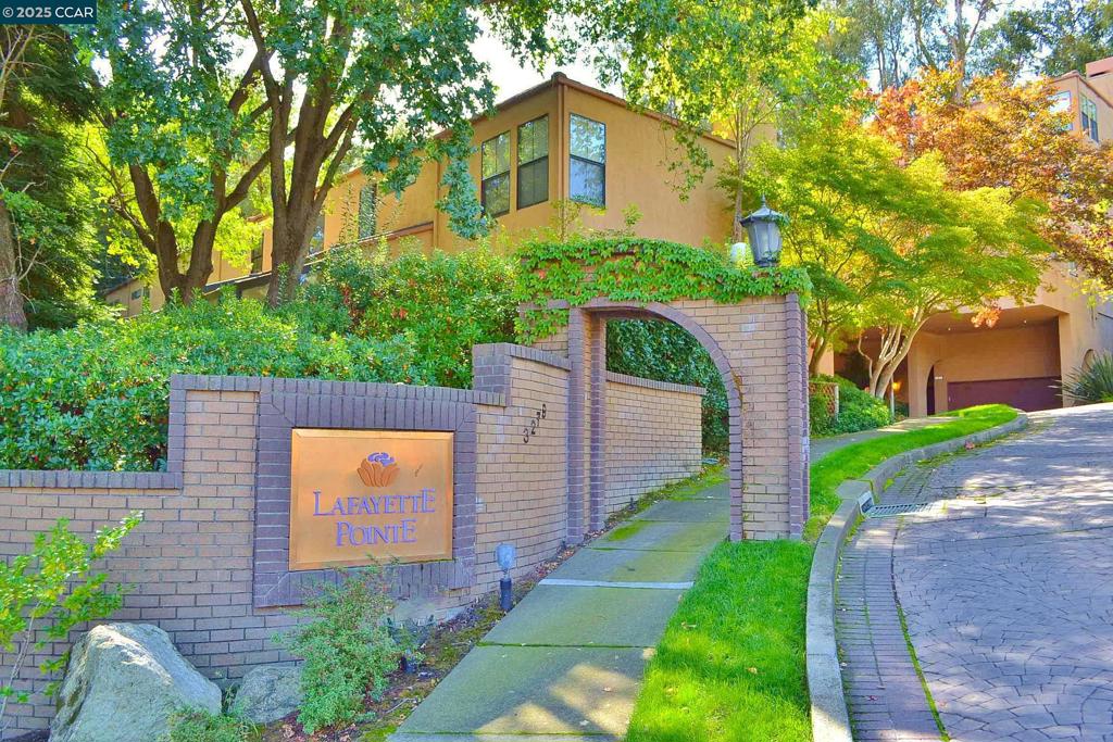 Fabulous downtown Lafayette end-unit townhome! This warm and inviting 2420 square foot home offers 3+ bedrooms, 3.5 bathrooms. Freshly painted, this home has a wonderful open floor plan with an updated kitchen, ample bathrooms, gleaming engineered hardwood floors, plus a HUGE bonus room that could be used as a 4th bedroom, family room or in-law set up. Light and bright with an abundance of windows. This property is a perfect 10 for those who like to entertain and desire easy living. Two car attached garage with auto opener. One of only two units in Lafayette Pointe this large. Summer is coming and the sparkling pool is just steps away! You can't beat the location close to downtown Lafayette, BART, Hwy 24 and minutes to downtown Walnut Creek. Top notch Lafayette schools!