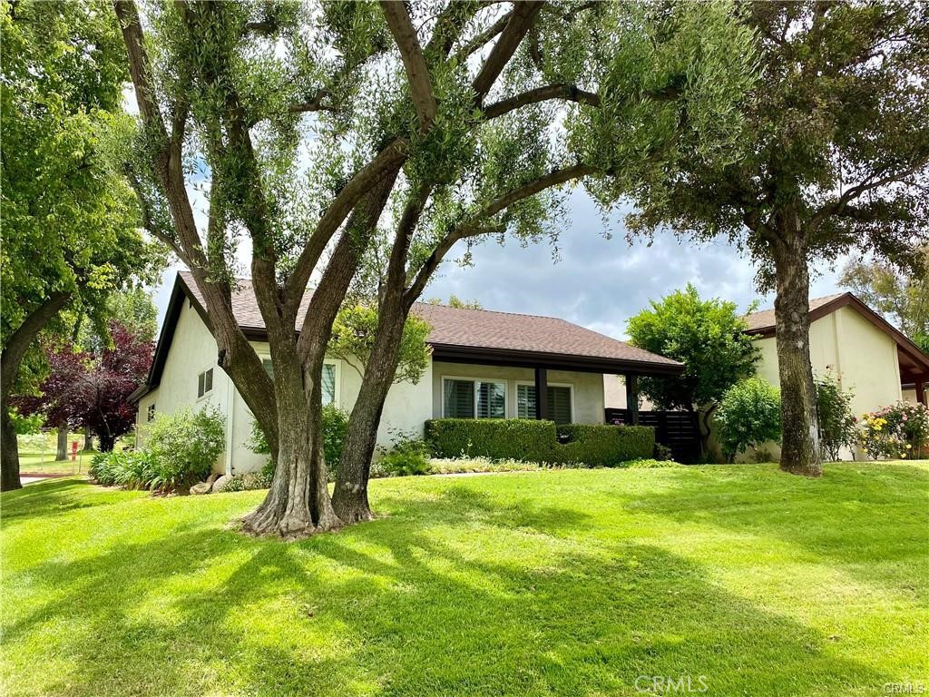 Desirable End-Unit in Country Village!
This charming corner-lot home is truly move-in ready with a 5-year-old 30-year roof, 5-year-old water heater, dual-pane windows, and plantation shutters. All appliances stay — including a washer and dryer just 3 years old.
Enjoy your private yard with a spacious covered patio, perfect for morning coffee or evening BBQs. The two-car carport and exterior storage add convenience, while the community offers beautifully maintained grounds, a sparkling pool, and a relaxing spa. A rare find in a sought-after neighborhood!