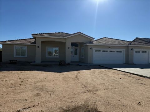 Photo of 18453 Ranchero Rd, Hesperia, CA 92345 (MLS # HD25281852)