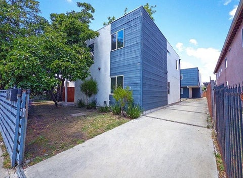 Photo of 645 W 97th ST, Los Angeles, CA 90044 (MLS # PW26202421)