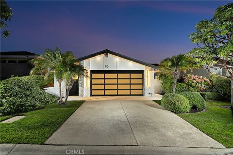 Photo of 10 White Water Drive, Corona Del Mar, CA 92625 (MLS # OC26073834)