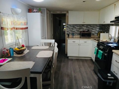 Photo of 26235 E 9th Street #36, Highland, CA 92346 (MLS # IV26072414)