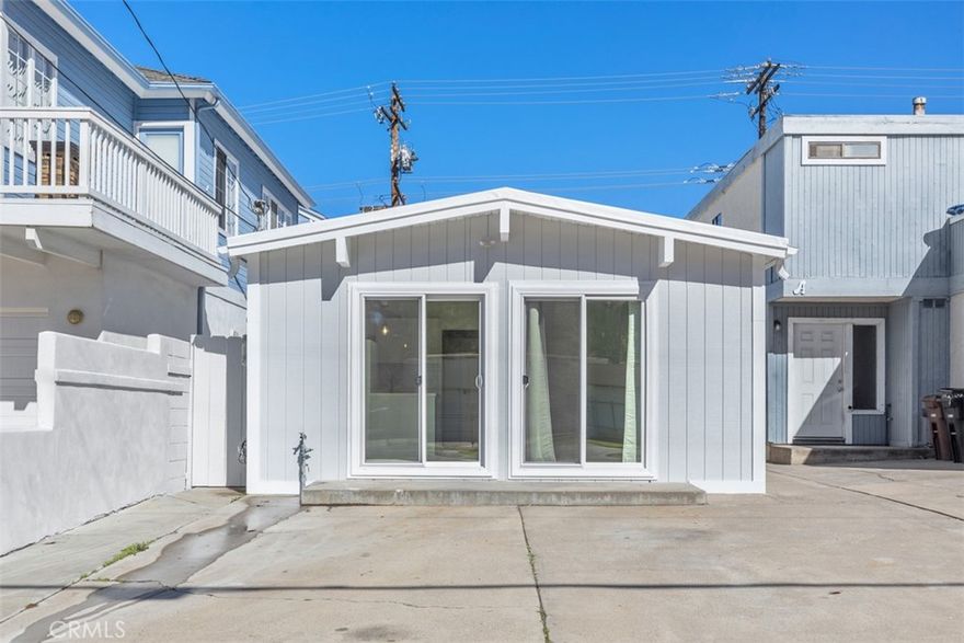 This updated single-level 2-bedroom in Doheny Village is available now! Light, bright, and recently updated, this single-level home has just one shared wall and no one above you. The kitchen has a fresh coastal feel with stainless-steel appliances and opens right into the living area, where the glass slider lets in natural light and provides easy outdoor access. The primary suite is tucked away at the back with a roomy walk-in closet, while the front bedroom offers its own exterior access that is perfect for guests or a home office. The bathroom includes a walk-in shower, crisp white finishes, and a fun pop of blue and gray tile. Other perks include ceiling fans in both bedrooms, an oversized driveway with plenty of parking, and convenient on-site laundry. All of this in the ever-evolving Doheny Village, just minutes from Capistrano Beach, Dana Point Harbor, PCH, and the 5 Freeway.