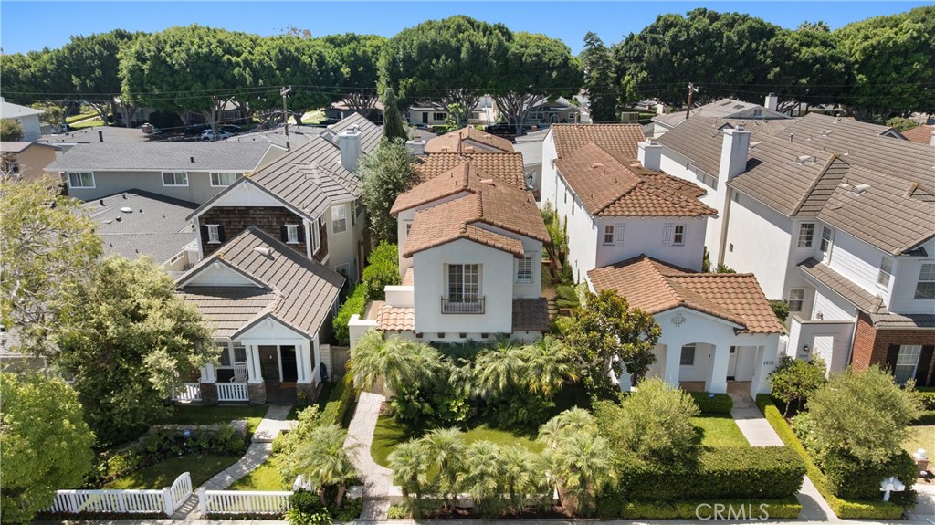 Situated in the highly desirable Cliff Haven neighborhood of Newport Heights, this beautifully remodeled and detached home offers the perfect blend of comfort, style, and location. With its light-filled layout and thoughtful design, the home is move-in ready. The spacious living and dining areas feature soaring ceilings, crown molding, recessed lighting, and newer flooring, creating a warm and elegant atmosphere. The upgraded kitchen opens to a cozy family room with high ceilings, a fireplace, and gorgeous French doors that lead to a generous side yard—ideal for entertaining or relaxing in privacy. The kitchen is equipped with granite countertops, bar seating, stainless steel appliances, a walk-in pantry, and a large center island. Upstairs, the luxurious master suite includes a recently remodeled bathroom with a soaking tub, separate shower, and walk-in closet. Three additional bedrooms provide plenty of space for family or guests. The second floor also features a convenient laundry room and a built-in desk area, perfect for working or studying from home. Additional amenities include a two-car garage and a location that’s just a short walk to Newport Harbor High School, nearby beaches, and popular restaurants. Although technically a condo, this detached two-story home lives like a single-family residence and offers the best of coastal Newport Beach living.