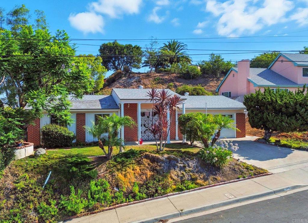 Classic Mount Nebo/Eastridge opportunity! Welcome to 7910 Wetherly St. This 4BR/2.5BA, 1,947 sq ft La Mesa home boasts a desirable U-shaped footprint that frames a sunny entry courtyard and delivers standout curb appeal with its charming columned entrance. Cherished by one family for decades, it’s a true blank slate—move in now, refresh over time, or upgrade now and make it your own. Inside, a thoughtful layout tucks all bedrooms into a single private wing, while the main living spaces either face the courtyard or open to the backyard—creating multiple indoor/outdoor areas for relaxing and entertaining. Two full baths plus a convenient powder room serve the home, and the vintage finishes are clean, functional, and absolutely move-in ready—especially if 1963 is your vibe. The layout also lends itself to various Jr. ADU possibilities. Out back, a good-sized yard offers room to play, garden, and gather. A broad slope climbs to a hilltop gazebo with beautiful views—perfect for morning coffee or golden-hour sunsets. The substantial upslope may also offer space for an accessory dwelling unit (ADU) or terraced gardens (buyer to verify feasibility with the City). With classic bones, a private bedroom wing, and that signature courtyard, this property invites your vision—preserve the mid-century character or reimagine with modern updates. All this in the Eastridge subdivision—just over a mile to Downtown La Mesa, a little over a mile to the 94, and about 1.5 miles to the 8. Close to Helix Charter and La Mesa Arts Academy. Don’t miss this attractive offering with potential, presence, and a setting that’s hard to find. (Information deemed reliable but not guaranteed. Buyer to verify square footage, lot use, permits, and ADU potential.)