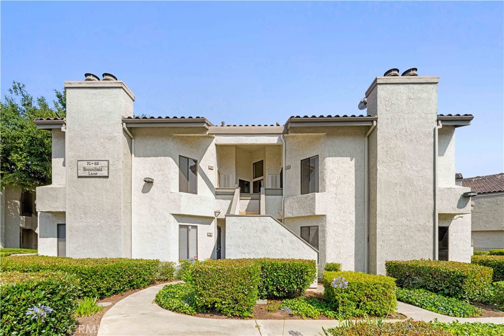 Welcome to a vibrant community where convenience meets comfort! This FHA and VA-approved complex offers an array of amenities, including a large pool, clubhouse, four spas, and a playground, ensuring endless recreation for all ages. Your new home features inside laundry, two private balconies, brand new carpet, fresh interior paint, a shared garage space for one car, and an additional permitted uncovered space. Enjoy peace of mind with 24-hour security and the added benefit of water and trash services covered by the HOA. Perfectly situated, this complex provides easy access to freeways, diverse shopping options, and highly-rated schools, making it an ideal choice for a convenient and enjoyable lifestyle.