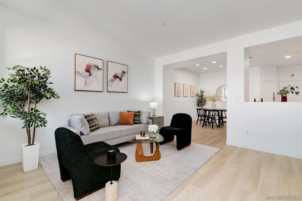 Welcome to 7895 Via Montebello, a beautifully renovated townhome in the highly sought-after Cortina community of Torrey Highlands. This spacious two-bedroom, two-and-a-half-bath residence has been thoughtfully upgraded by its original owner to reflect a clean, contemporary aesthetic. Airy interiors are enhanced by wide-plank LVP flooring, a custom white oak staircase, and refined finishes throughout. The kitchen is a true showpiece, featuring sleek quartz countertops, a full-height backsplash, an eat-in island, a spacious double pantry, and upgraded stainless steel appliances—including a GE Smart Convection Oven and GE Profile cooktop—all anchored by a striking Blanco sink. Bathrooms have also been elevated with quartz surfaces, modern lighting, new fixtures, custom mirrors, and frameless glass shower enclosures. Enjoy a large entry patio ideal for outdoor entertaining, and a rare two-car garage—an upgrade over many neighboring units. The Cortina community also offers access to a beautifully maintained pool, spa, and clubhouse for residents to enjoy. Perfectly situated just a short walk from shopping, dining, and minutes from the 56 freeway, this turnkey home offers effortless access to all that North County San Diego has to offer—within a tranquil, private community setting.