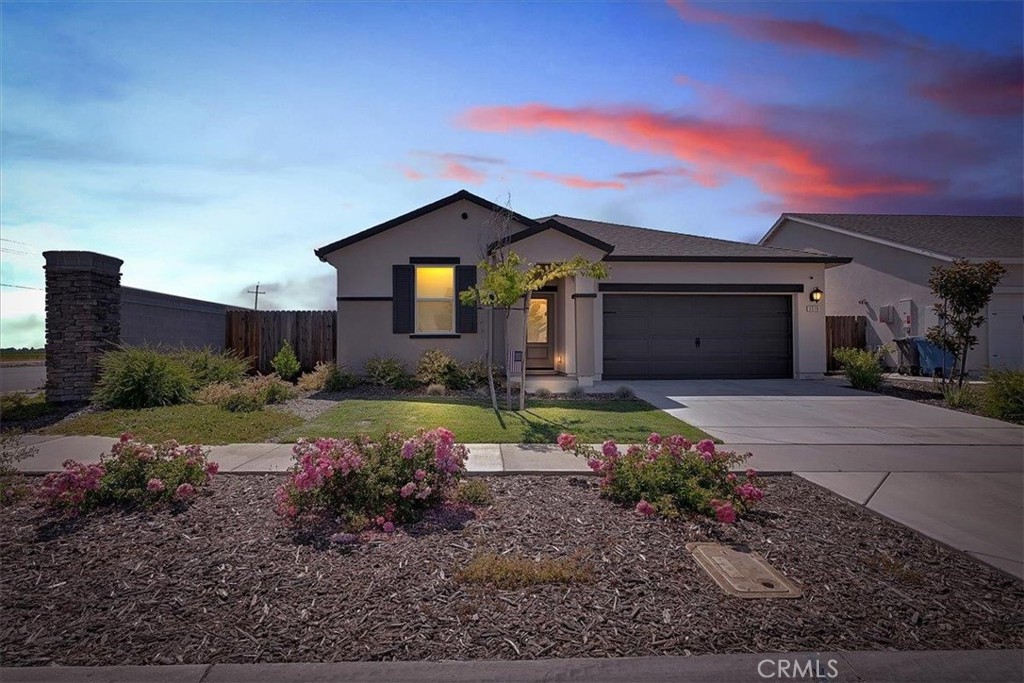 Welcome to this beautiful 2023-built home located in The Orchards community move-in ready and packed with modern upgrades! This charming single-story residence offers 3 bedrooms and 2 bathrooms, thoughtfully designed with comfort and functionality in mind. The open-concept kitchen flows seamlessly into the family room, making it the perfect space for everyday living and entertaining. The spacious primary suite is your personal retreat, featuring a nice en-suite bath with a large walk-in shower, stylish vanity, and generous walk-in closet. Enjoy added value with included upgrades such as granite countertops, energy-efficient appliances, owned solar, battery backup, EV charger, and a Wi-Fi-enabled garage door opener. You'll love the ample storage throughout the home, plus the convenience of a corner lot near parks and schools. With quick access to Highways 70, 65, and 99, and just minutes from Costco and Hard Rock Casino, this home blends comfort, convenience, and modern style all in one. Don't miss your opportunity to make it yours!