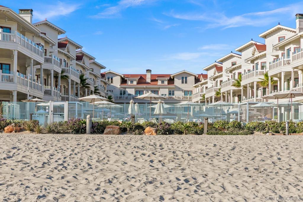 Coastal Luxury at The Shore House. Experience unparalleled elegance at The Shore House, an exclusive residence within the iconic Hotel Del Coronado. Perched on the penthouse floor, Residence 67 offers breathtaking panoramic views of the Pacific Ocean, Glorietta Bay, and the San Diego skyline—a stunning backdrop for an effortless blend of luxury and comfort. Designed for sophisticated living, this exquisite 2-bedroom, 2-bathroom residence features an open-concept layout bathed in natural light. The gourmet kitchen, equipped with top-tier appliances, is designed to inspire and elevate any gathering. Indoor and outdoor fireplaces add warmth and ambiance, setting the stage for cozy evenings or effortless entertaining. Step onto your spacious private balcony to savor the ocean breeze—ideal for morning coffee or sunset cocktails. Enjoy full ownership, limited use with the benefit of a hassle-free rental program managed by The Del, allowing you to generate income when you're away. This is your opportunity to own a turnkey luxury retreat in one of California’s most prestigious beachfront destinations. Seize this fabulous opportunity.