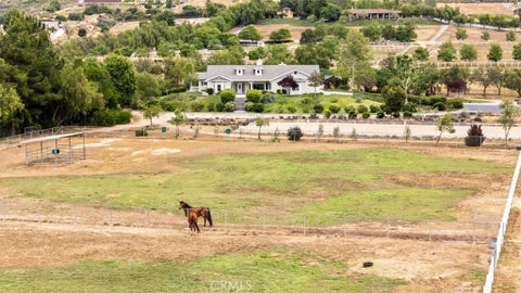Photo of 820 Santa Fe Highlands Dr Dr, Ramona, CA 92065 (MLS # IG26082688)