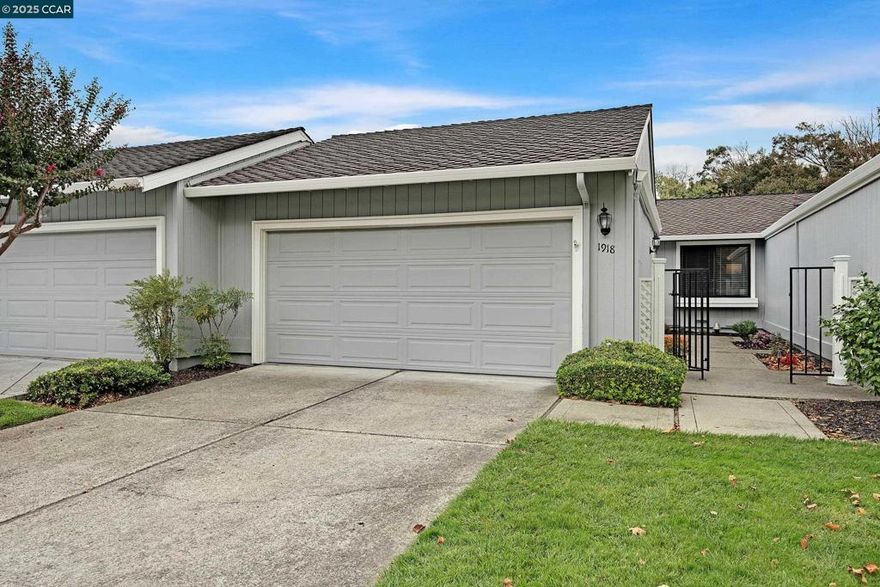 Welcome to this beautifully updated 2-bedroom, 2-bathroom home located right on the golf course of the Crow Canyon Country Club community. The light-filled kitchen has been completely remodeled with new cabinetry, sleek countertops, modern appliances and a cozy breakfast nook. A dedicated laundry room is conveniently located with direct access to the attached 2-car garage. The designated dining room opens to the atrium, ideal for indoor-outdoor entertaining. The atrium anchors the home and fills the interior with natural light. The living room, equipped with a fireplace, overlooks the not-to-be-missed back patio. The primary suite boasts soaring ceilings and a large closet. The updated primary ensuite features dual sinks, and a stall shower. A generous guest bedroom overlooks the private front courtyard and is serviced by a full bath with a shower-over-tub. Enjoy the best of indoor-outdoor living with a large back patio offering tranquil golf course views. With its prime location, updated features, and peaceful setting, this home blends comfort, style, and convenience in a premier gated community.