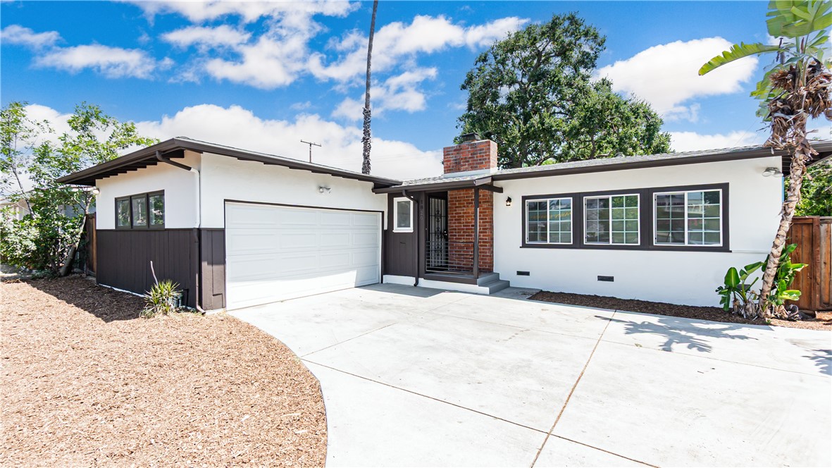 Just steps from the Claremont border, this beautifully renovated 3 bed 1 bath ranch-style home sits on a large lot with mountain views, under the canopy of a large California oak, with endless possibilities — including space for an ADU or other structures. Step inside and you’ll feel the care in every detail. The bright, open living space features new laminate floors, fresh paint inside and out, and a working wood/gas fireplace perfect for cool evenings. The newly renovated kitchen is a dream — quartz countertops, soft-close cabinets and drawers, a brand-new dishwasher, recessed lighting, and custom wooden shelving give it both style and function. The bathroom has been fully updated too, with all the modern touches you’d expect. All the major upgrades are done: new plumbing, new electrical in the kitchen and bath plus upgraded electric in the bedrooms, a newly installed energy-efficient mini-split system for heating and cooling, dual-pane windows, and a laundry area with brand-new hook-up valves and electric. Outside, the property shines with a fenced yard, a large brick patio for entertaining, and driveway access from both the front and rear — including a double-wide gate and RV parking. The two-car garage comes with remotes, plus driveway parking for three more vehicles. This home’s location offers the best of both worlds — a quiet, established neighborhood where neighbors have been here for decades, yet you’re walking distance to shopping, restaurants, and minutes to freeways for an easy commute. Move-in ready, Claremont-adjacent, and packed with thoughtful upgrades — 1820 Indian Hill is more than just a house. It’s a place to put down roots.
