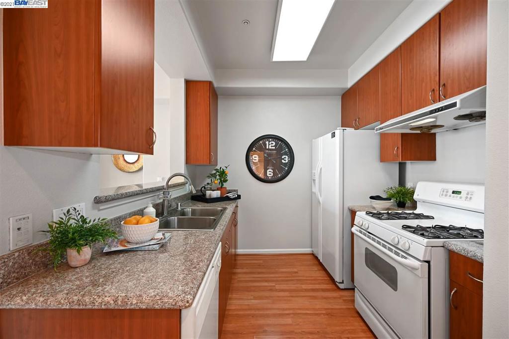 Welcome to 88 Franklin. This light-filled 2 bedroom 2 bathroom condominium is located on the top floor and has amazing city views. The freshly painted interior features an open floor plan with recessed lighting, a balcony off the living room and new carpet. The kitchen features granite countertops, gas stove and modern appliances. Each bedroom has ample closet space and its own bathroom. The in-unit laundry is a huge plus and convenience. The unit is conveniently located in the midst of Chinatown which allows you to enjoy the vibrant city lifestyle, urban attractions, local shops and restaurants.