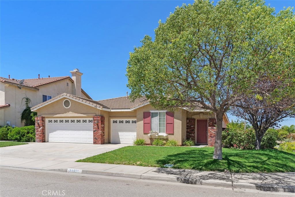 This charming and spacious RARE SINGLE STORY home in a peaceful cul-de-sac has 4 bedrooms, 2.5 baths, 3 car garage, is located in the prestigious community of OAKMONT II, it sits on an elevated large corner lot with beautiful views of the majestic mountains. The kitchen,family room, breakfast nook & hallway area are all tile and an open floor plan that combines comfort, the family room has a nice cozy fireplace. The formal living room, dining room and all bedrooms are NEWLY Carpeted, the whole house interior and exterior has been newly painted. Natural light brightens the living areas. The master bathroom has a separate shower and tube with a large walk in closet. This beautiful house has a large private backyard with many wonderful fruit trees that requires low maintenance. This house has NEW AC and it is located in one of the newer communities in the City of Wildomar. It's close to the shopping center and easy freeway access (15 & 215 ). This house is one of the few single level homes in the area on the border of the city of Murrieta. Your new home awaits. Must see.