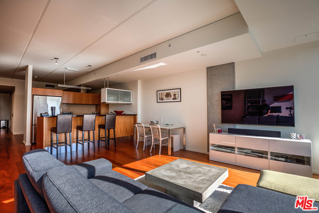 The prestigious Evo building is located in the vibrant community of South Park, home to iconic entertainment venues such as Staples Center, LA Live, and Nokia Theater. This sleek and stylish unit is located on the seventh floor which gives the unit wonderful city views. Gorgeous hardwood flooring, beautiful kitchen cabinetry, quartz counters, dine-in bar area, stainless steel appliances, and large bathroom w/ spa tub all add to the mystique. With an amenity package beyond compare, you will enjoy a 6th floor sundeck and resort style pool, a rooftop lounge, state of the art fitness center, and a 24 hour dedicated concierge, all within a short walking distance to LA Live and the Staples Center. Evo towers over the west end of downtown, allowing for some of the most dramatic views of the Los Angeles skyline. AVAILABLE IMMEDIATELY.