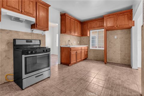 Photo of 657 E 53rd St, Los Angeles, CA 90011 (MLS # DW26015706)