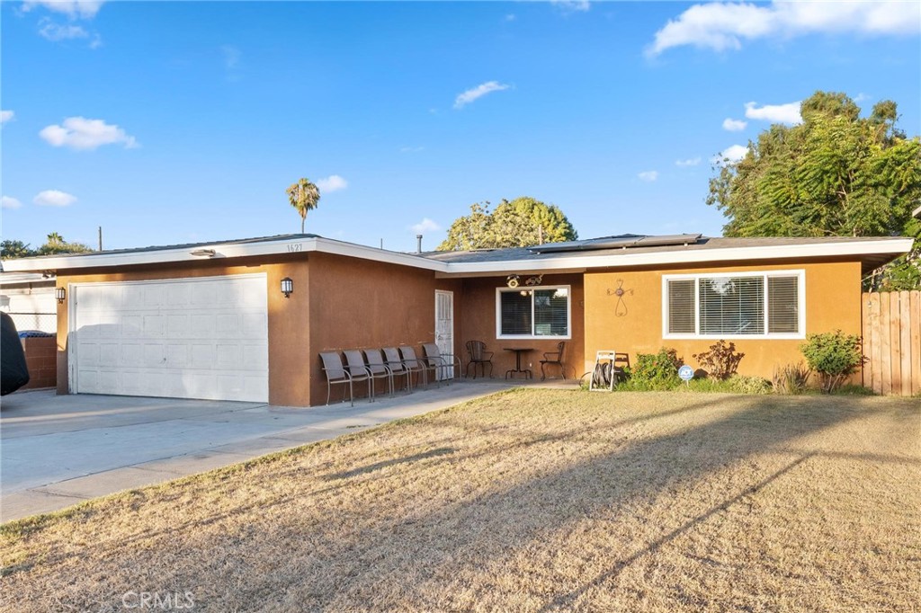 This 3-bedroom, 2-bathroom single-story home offers 1,273 square feet of living space on a generous 8,820 square foot lot—full of potential for buyers looking to customize and add value. Recent upgrades provide a strong starting point, including a new roof (installed just 2 years ago), new windows, a new furnace, and paid off solar panels, giving peace of mind and a solid foundation for future improvements. The home features a spacious, light-filled layout and sits on a large lot with plenty of room for outdoor living, gardening, or expansion. An attached 2-car garage adds convenience, while the property's location enhances its appeal—just minutes from the 60 Freeway, schools, grocery stores, and everyday essentials. Whether you're a first-time buyer, investor, or someone looking for a project with promise, this is a fantastic opportunity to build equity and create your dream home in a well-established Ontario neighborhood.