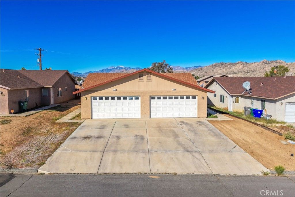Photo of 7176 Murray Lane, Yucca Valley, CA 92284 (MLS # JT25242175)