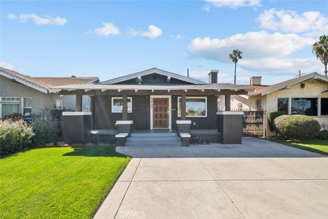Photo of 1848 Middleton Pl, Los Angeles, CA 90062 (MLS # OC26144160)