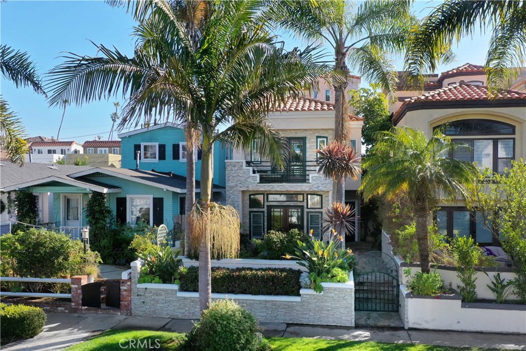 Gorgeous Beach Estate with roof top deck in a phenomenal location, a few blocks from the beautiful Pacific Ocean, Main Street, famous HB Pier and Pacific City with over $100k in recent upgrades. Walking distance to a local park and children's playground on the sand, and HB Farmers Market! 3 bedrooms + a 3rd level loft which includes a pull-out Queen sofa sleeper, a feather pillow topper, new smart TV, fireplace, patio, kitchenette, full bathroom, closet, and direct access to rooftop deck. The first floor has an open floor plan including a great room with new flooring, dining, fireplace (all fireplaces are for battery candle use only). French Doors lead out onto a stone patio with a gas fire pit, lounge furniture and beautiful, lush landscaping. The Kitchen is remodeled with quartz counter tops, pull out drawers, upgraded appliances including a new built in Kitchen Aid refrigerator, Viking electric cook top with auto vent, 1 standard oven, microwave, and Bosch dishwasher. The kitchen is fully stocked with all your cooking needs, it also includes a nook area with French doors opening onto another patio with a gas BBQ. 2nd floor offers 2 master suites; first includes a King bed with fireplace, balcony, and walk in closet, with a large Master Bath including soaking tub, separate shower and double counters with upgraded sinks and high-end fixtures throughout this home. 2nd Master has a Queen bed, room is large enough to include a single daybed with trundle, new California Closet, newly remodeled full Master bath with tub, large shower, and double sinks. Third bedroom has a double bed with single trundle, closet, and French doors. This home has two stairwells for quicker and quieter access to each Master and to the rooftop. The 2-car garage has extra lighting, 2nd refrigerator, a new epoxy floor, utility sink, and is fully stocked with bicycles, wet suits, chairs, umbrellas, and other beach accessories.
The highlight of this home is the multiple indoor-outdoor areas, the rooftop is equipped with comfy patio chairs and lounges, new TVs in each room. This Luxury home is fully furnished, only food and clothes are needed. Owners have recently replaced all doors, windows, and screens with Anderson, increasing air flow for summer months.