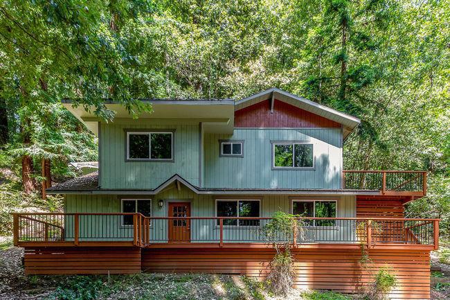 Rare Opportunity! Builder Special! House/Workshop/garage, paved Circular drive. 2 APN's for .44 acre total. Good privacy, close to BC Golf & Country Club approx. 4miles from town. House was expanded without permits. SC COUNTY "Stop worked previous owner". Now 2-3 bed with Aprox. 1485 Sq ft, Exposed studs. Need Cash/hard money. Have floor plan. Need to submit new plans. PG&E will hook up temp power during remodel, WATER - Big Basin installed new main lines after CZU but buyer to add new lines to house. Septic leach lines were blocked, may need repair or new leach? This Property includes APN 086-181-06