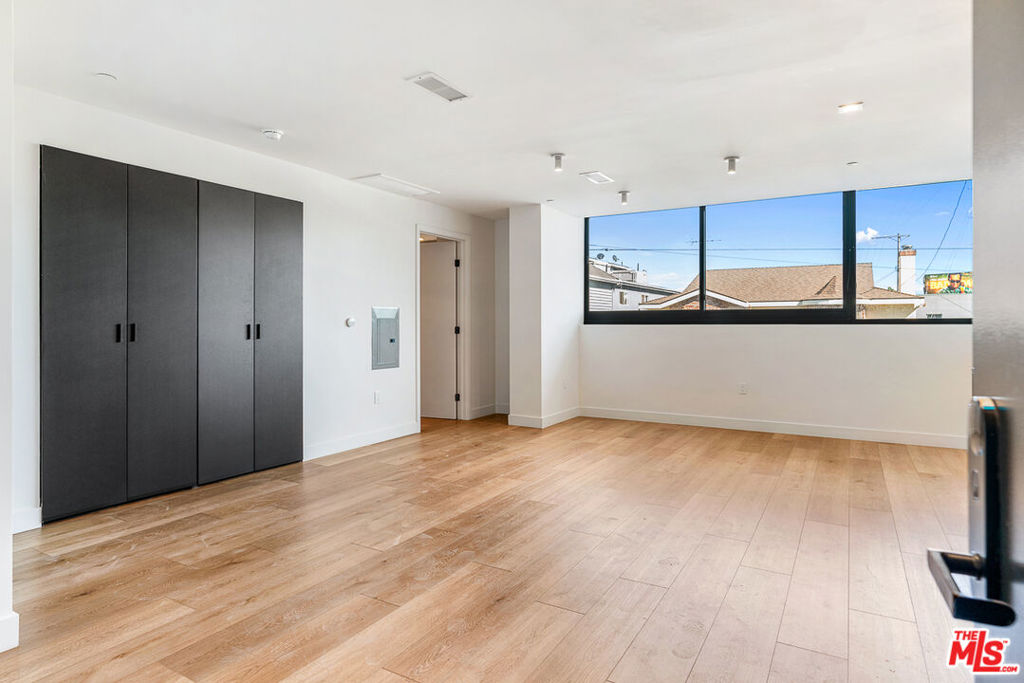 Venue Residences by Helio. This studio residences is on the 2nd floor with South facing views. Kitchen has unique dark finishes with stained granite counters, matte black fixtures, and stainless steel Beko appliances including fridge, dishwasher, and gas stove. The living area has recessed lighting, blackout window shades, and a custom wall closet. The bathroom has a wall-to-wall mirror, under sink storage, and shower/tub. Property amenities include: Fitness center with Technogym equipment, co-working spaces, front desk staff, and 2 rooftop lounges with a heated dipping pool and outdoor cooking area. Off-site parking available for $125/month. Internet $84/month. Unit is available in October. Contact us today!