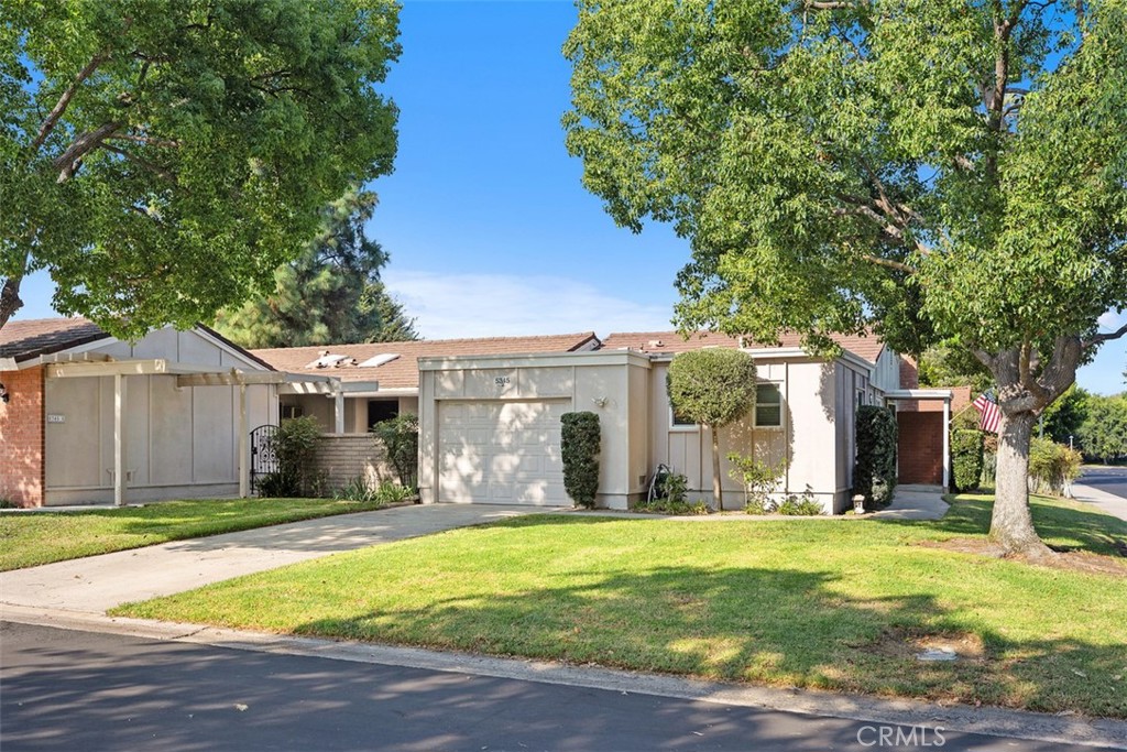 Welcome to this stunningly renovated 2Bd/2Bath end-unit home in the prestigious guard-gated Laguna Woods 55+ community. No stairs or steps! Inside, you’ll love the inviting white brick fireplace and designer kitchen with custom shaker cabinetry, farmhouse sink, quartz counters, and stainless-steel appliances. Wood laminate flooring, central heating and air, recessed lights, newer windows, and an interior washer/dryer add style, comfort, and convenience, while custom Elfa closets maximize organization. Both bathrooms showcase modern upgrades and walk-in showers. A private patio offers the perfect outdoor retreat, ideal for relaxing or entertaining. This lovely home has an attached 1 car garage, a long (maybe 2 cars deep) driveway, and a location close to a bus stop and adjacent to preserved land all on a quiet cul-de-sac street! The HOA dues cover basic cable TV, water, and trash, along with an array of amenities including 5 Pools/ Spas, 7 Clubhouses, Golf, Tennis, Fitness Centers, Library, Golf Course Restaurant, Performing Arts Center, Equestrian Center, bus system around the community, to area shopping, restaurants, medical facilities, and over 200 clubs offering a vibrant social lifestyle. This is the perfect place to call home!