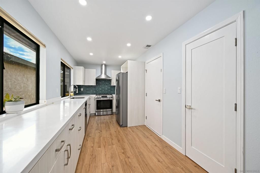 Photo of 10314 Rochelle Ave Ave, Santee, CA 92071 (MLS # 250042361SD)