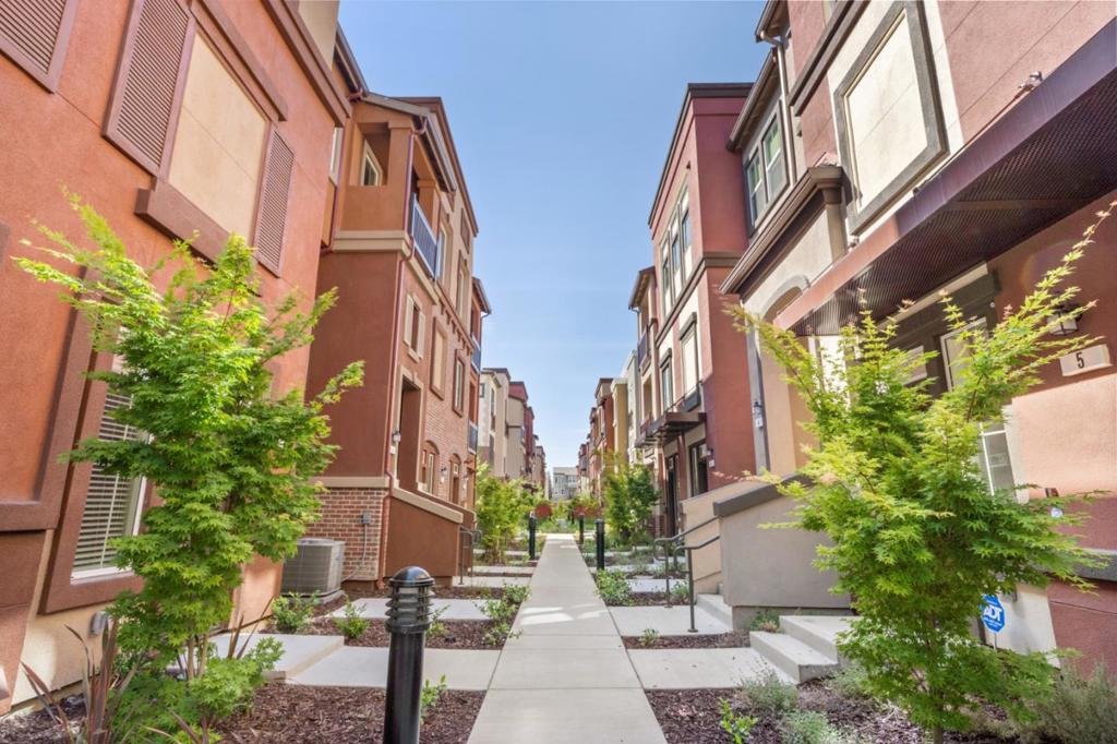 Like new and still under builder's warranty!! Built in 2019. This 3rd floor townhome-style condo located in the middle of the KB Apex at Berryessa Crossing. Quiet, maple tree-lined environment creates a serene community. Open concept living area over $50k in upgrades including: vinyl floor, Caesarstone counter top, AT&T Gigabit fiber Internet pre-wired to closet, additional recessed lights, and motion activated kitchen faucet, etc. Master Bedroom with a walk-in closet & master bath suite. Hunter Douglas wood shades in the bedrooms. Two-car SIDE BY SIDE garage has a 50-amp junction box pre-wired for an EV charger. Ethernet ports in garage and living room provides better internet connection. Smart light switches and additional power outlets near toilets provides extra convenience. Close to San Jose airport and major highways. Minutes away from the future Berryessa BART station. Easy commute to major employers. Great Opportunity for first-time homebuyers or investors.