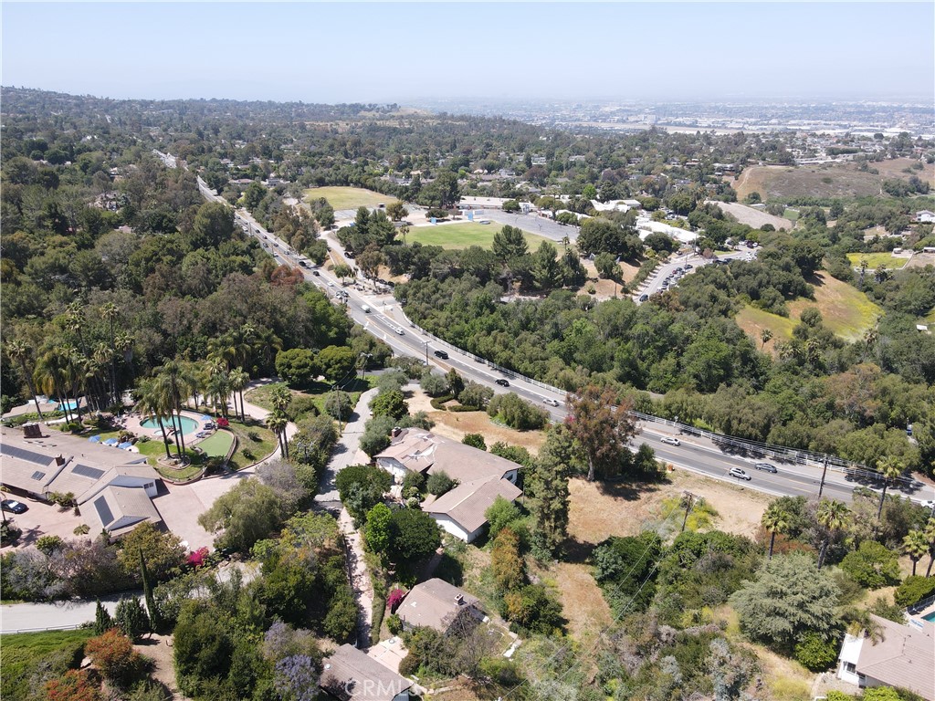 Investor’s Dream in Rolling Hills – Rare Fixer-Upper with High Upside Potential.
Unlock the hidden value of this prime real estate opportunity in the prestigious City of Rolling Hills. Set on a sprawling lot of 1.16 acres along tree lined Palos Verdes Drive North, this single-level property is brimming with potential and ready for transformation. Whether you're a seasoned contractor, investor, or a visionary homeowner seeking your next project, this fixer-upper offers the perfect canvas to maximize value and returns.
With 4 bedrooms and 4 baths, 3,822 sqft of living area, the layout includes 3 structures, making it ideal for multi-generational living, dual rentals, or a complete redesign into a luxury estate. The front house is Red Tagged, foundation issue is detected. Separate driveway to the back structure, which could be an independent living area with privacy. The middle structure appears to be a living area with bathroom. Original architectural details remained, including intricate brickwork and charming mosaic glass accents that speak to the home's timeless character. Easy commute off of the Hills, close vicinity to great schools in the Palos Verdes Peninsula School District, as well as private schools such as Chadwick School and Country Day.
Bring your crew, your architect, and your ambition, an opportunity like this is rare in the prestigious Rolling Hills.
