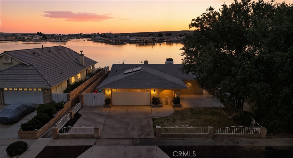 Welcome to your dream lakefront retreat at This beautifully updated 3-bedroom, 2.5-bathroom home with a 2-car garage offers the perfect blend of modern upgrades and resort-style living in the highly desirable Silver Lakes community.
Step inside to enjoy brand new hardwood flooring, new carpet, and fresh interior paint throughout. The open floor plan leads to a spacious backyard designed for entertaining, featuring a built-in BBQ island, private boat dock, and a paddle boat included — all overlooking peaceful lake views.
Whether you're sipping coffee by the water or enjoying a sunset cruise, this property offers a rare opportunity to live the waterfront lifestyle every day.
Community Features Include:
Pool, Spa/Hot Tub & Sauna
Pickleball, Tennis & Paddle Tennis Courts
Golf Course Access
Clubhouse, Gym, Banquet & Recreation Rooms
Dog Park, Playground, Picnic & BBQ Areas
Fire Pit, Outdoor Cooking Spaces
Common RV Parking, Controlled Access, and Pet-Friendly Rules
Located in the heart of Helendale, Centered between the market and North lake beach. Close to Golf course and Clubhouse.
Disclosure: Seller holds an active California real estate license.