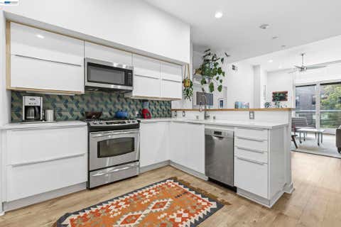 Photo of 630 Thomas L Berkley Way Way #403, Oakland, CA 94612 (MLS # 41127052)