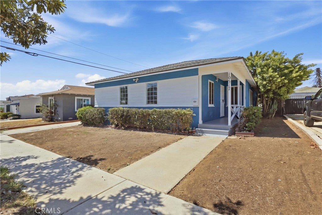 Photo of 10517 Cimarron ST, Los Angeles, CA 90047 (MLS # IN26201436)