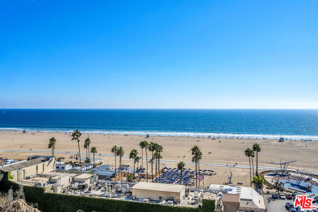 Opportunity knocks twice. Spectacular Ocean views up the coast to Malibu from this 2-bedroom, 2-bathroom plus loft home in this exclusive, boutique Ocean Avenue building. The kitchen offers granite countertops, a microwave, and a wine fridge. The Loft with its custom-built-ins, makes the perfect home office, a media area, or even a 3rd bedroom. The Loft area opens to a rooftop sun deck with 180-degree views. Watch the ocean, catch the sunset, or just gaze out to the coastline up to Malibu. Cross the street to Palisades Park. Additional features include ample closet space, cedar-lined drawers for your Winter wardrobe. in-home laundry, and two side-by-side parking spaces. Just a stone's throw from shops and cafes along Montana Avenue. This home offers sophistication and convenience. No pets, please.