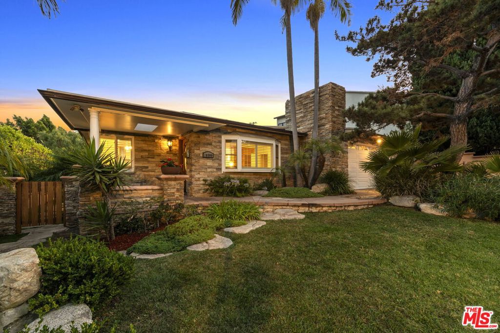 Fabulous contemporary residence in sought after Cheviot Hills, half a block from the exclusive Griffin Club! Beautifully updated split level home on a generous corner lot with a spacious, private garden and double garage with interior access. Bright and airy with high ceilings and an open floor plan, featuring a fully appointed chef's kitchen with granite counters and stainless steel appliances including dual Miele wall ovens. The gigantic island counter with breakfast bar flows seamlessly into the spacious living areas, perfect for those who love to entertain as well as cook. Three steps up to the private family wing with three well-proportioned bedrooms including a generous primary suite with walk-in closet and ensuite bath.The covered patio is an entertaining paradise with a 42" Lynx grill, cooktop & bar fridge creating a complete outdoor kitchen. The fire pit and built-in heating make it perfect for year-round Californian living. Beyond the patio, the backyard is a secluded, sun-filled oasis with lush plantings and mature trees giving complete protection from prying eyes. Across the street, the Griffin Club will become your second home with its pools, bars and restaurant it is the hub of the community, where kids play and friends meet. This home is nestled in the heart of Cheviot Hills with the award-winning Overland Elementary School within walking distance. Close to Beverly Hills, Century City and all that West LA has to offer. A rare Cheviot Hills Opportunity!