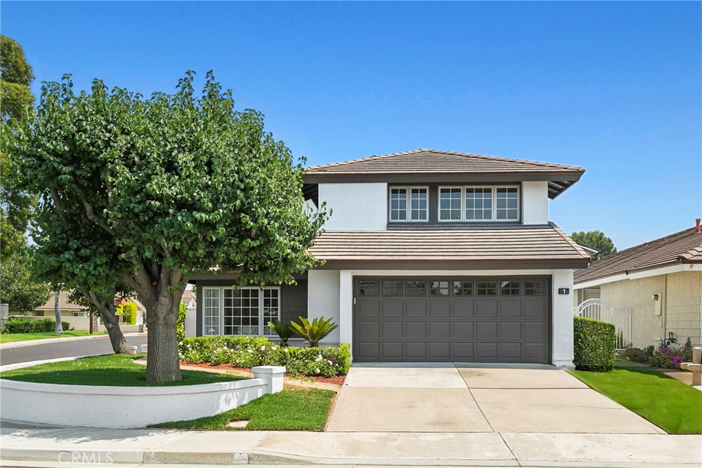 Welcome to 1 Silver Fir, a meticulously remodeled home featuring 5 bedrooms, 4 bathrooms, plus a dedicated in-law suite! This stunning residence is ideally situated in the coveted inner loop of Woodbridge, nestled on a large, private corner lot within a tranquil cul-de-sac. You won't want to miss the opportunity to experience this exceptional property.
This spacious home boasts an open floor plan with soaring ceilings, abundant natural light, and a generously sized kitchen with a dining area. A main-level bedroom offers versatility, while the in-law suite provides additional living space. Throughout the home, you'll discover luxury vinyl wood plank flooring, fresh interior paint, new baseboards, and new cabinetry.
Upon entry, you'll be greeted by a stunning new staircase and vaulted ceilings that create an open, airy ambiance. The expansive living room is bright and inviting, complete with a marble fireplace and built-in cabinetry. A main-level bedroom with French doors is perfect for a home office.
The renovated kitchen, truly the heart of the home, is both stylish and functional. It features elegant porcelain countertops, marble backsplash, custom cabinetry with gold-toned hardware, and brand-new LG Stainless Steel appliances. The kitchen seamlessly flows into the dining area and extends to the outside covered loggia, perfect for entertaining.
The upstairs level includes three secondary bedrooms and a spacious primary suite. The primary suite is generously sized and boasts a gorgeous, fully remodeled bathroom with double sinks, a vanity area, and a beautifully updated shower.
As an added bonus, the garage has been thoughtfully converted into a studio apartment, complete with its own bathroom, kitchenette, closet, and space for laundry. This versatile space can be rented out or is ideal for an in-law suite, and it can easily be converted back to a two-car garage if desired.
The exterior has been freshly repainted and professionally landscaped with new sod, sprinklers, roses, and more. The spacious backyard offers ample room for play, gardening, or simply relaxing, and includes a large covered patio, perfect for entertaining.
This home is ideally located on a quiet street, just minutes away from award-winning schools, North Lake, parks, pools, tennis courts, local shopping, and convenient access to Woodbridge's iconic lakes and lagoons. Don't miss out—this home won't last long!