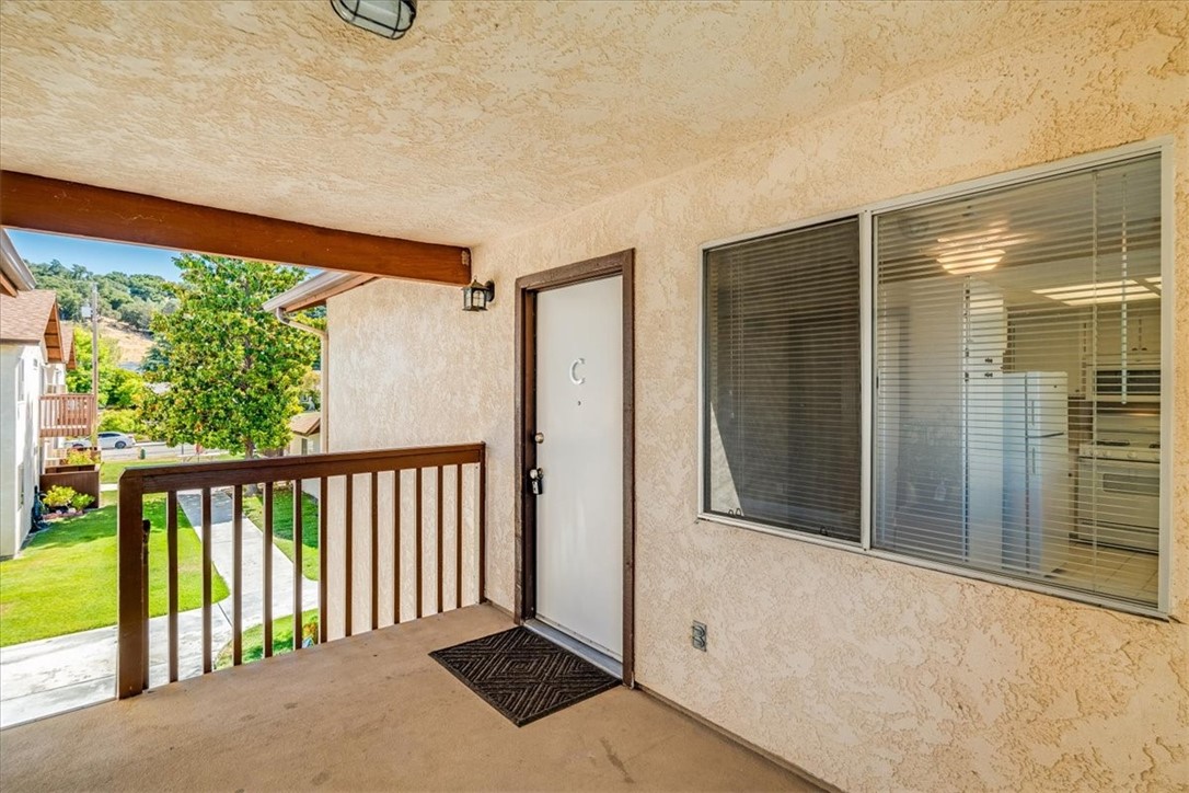 Why rent when you can own this spacious, second-level condo in a quiet, well-maintained neighborhood? Featuring 858 sq' that includes 2 bedrooms and 1 bathroom, this single-level unit boasts an open floor plan with an elevated balcony. Large bedrooms with ample closet space. Fresh paint and new carpet throughout. Crown molding and updated windows. The kitchen is well-appointed with tile flooring, stainless steel sink and faucet, gas stove/oven, microwave and refrigerator. Additional features include detached 1 car garage with additional designated parking spot and on-site laundry. Low monthly HOA fees. Pets are welcome. Jump in the pool on those hot Summer days!! Enjoy the central location close to downtown, shopping, and entertainment.